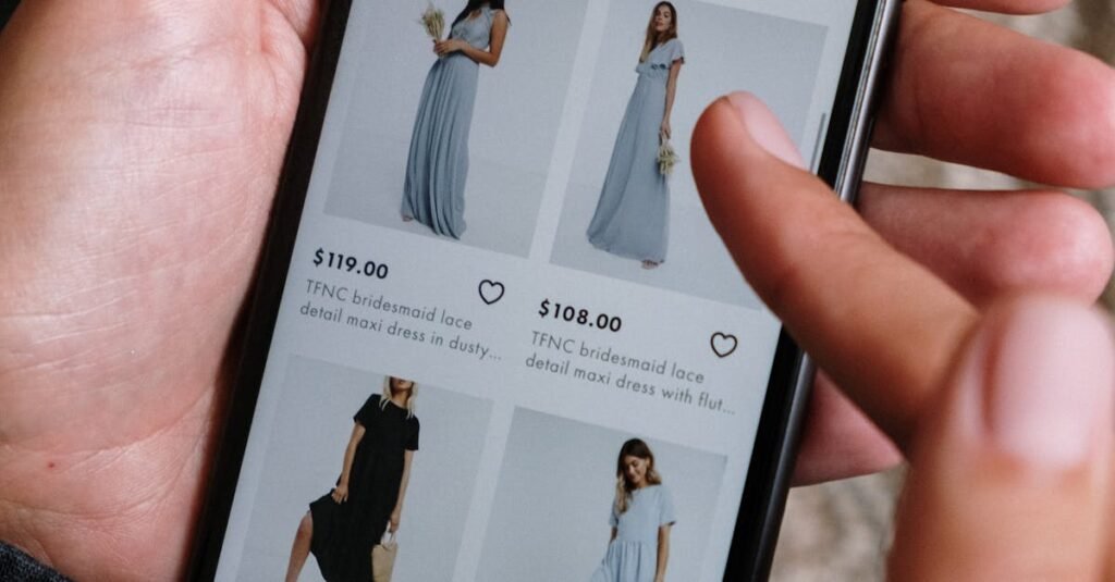 A person browsing clothing options on a smartphone for online shopping.